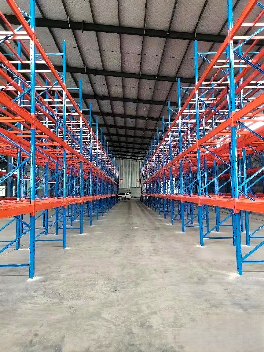 Sistem Rak Palet Tugas Berat Penyimpanan Tinggi Selektif Warna Biru dan Oranye dengan Perlindungan Korosi 5 Lapisan Standar ISO CE